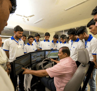 A  trainer giving training to students in lab